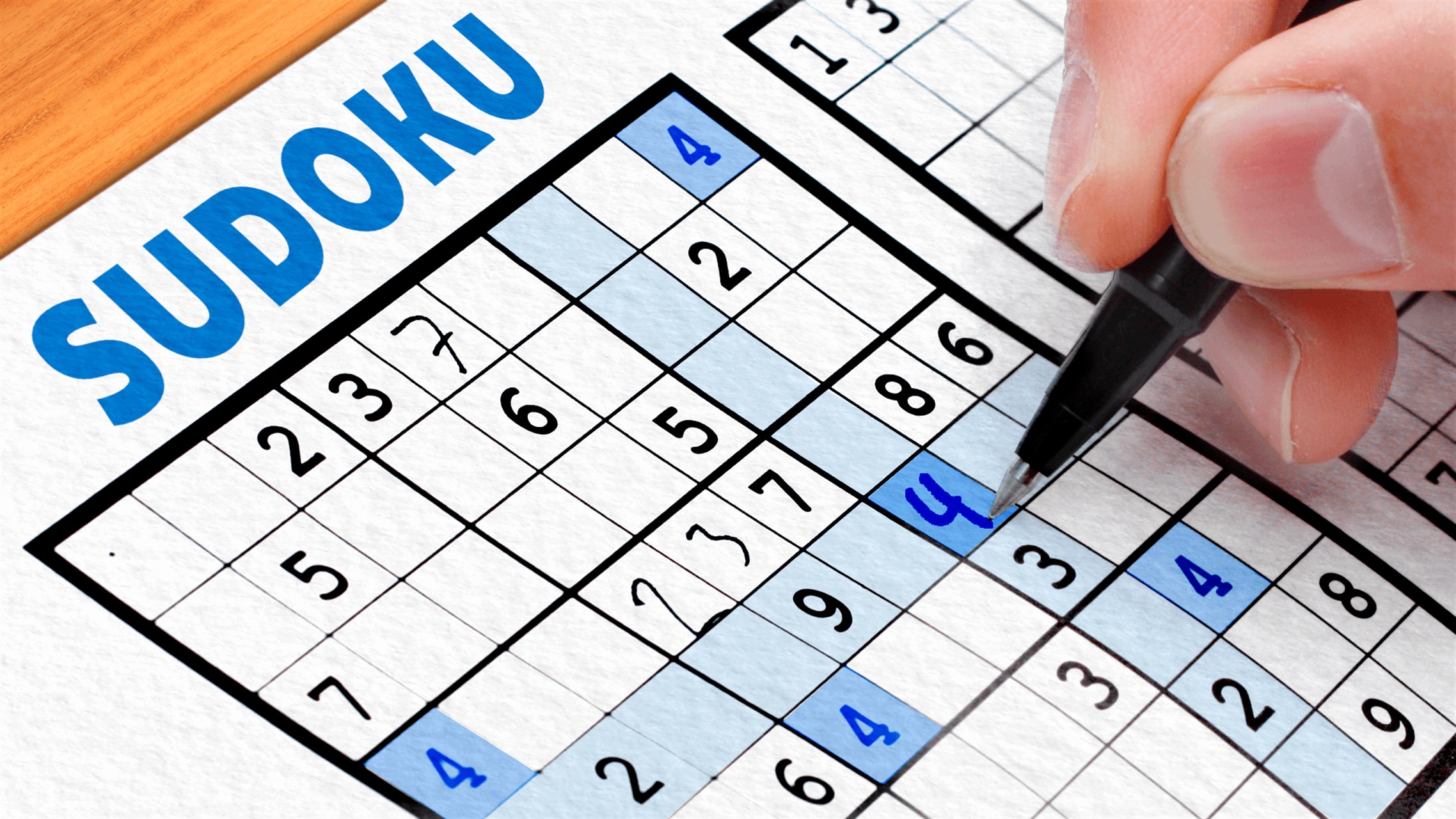 Sudoku puzzle on a clean desk for brain training